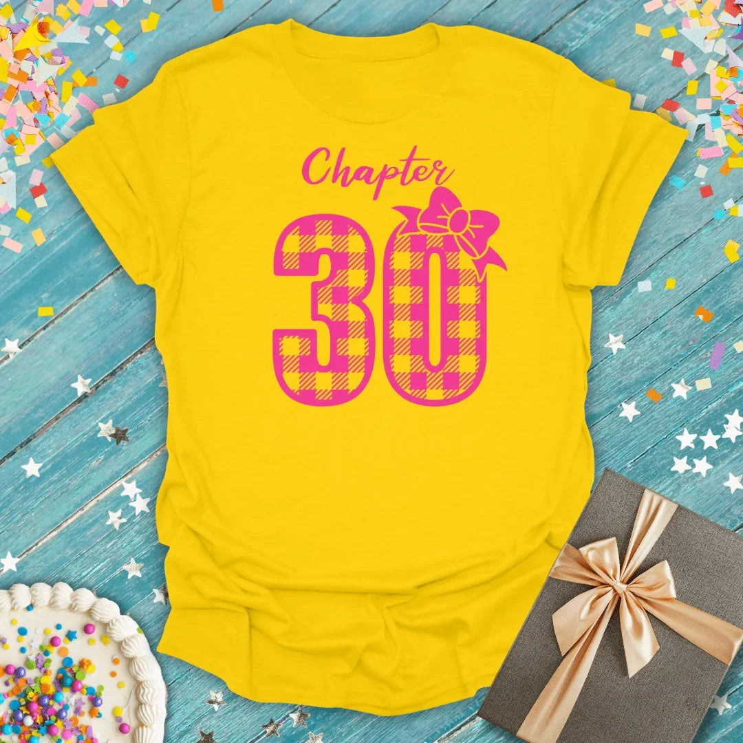 Yellow birthday tee with 'Chapter 30' in pink plaid, perfect for 30th birthday celebrations and gifts.