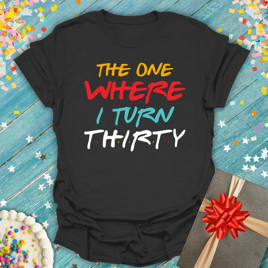 Black Epic Era Tees t-shirt with colorful 'The One Where I Turn 30' text in a TV show style font.