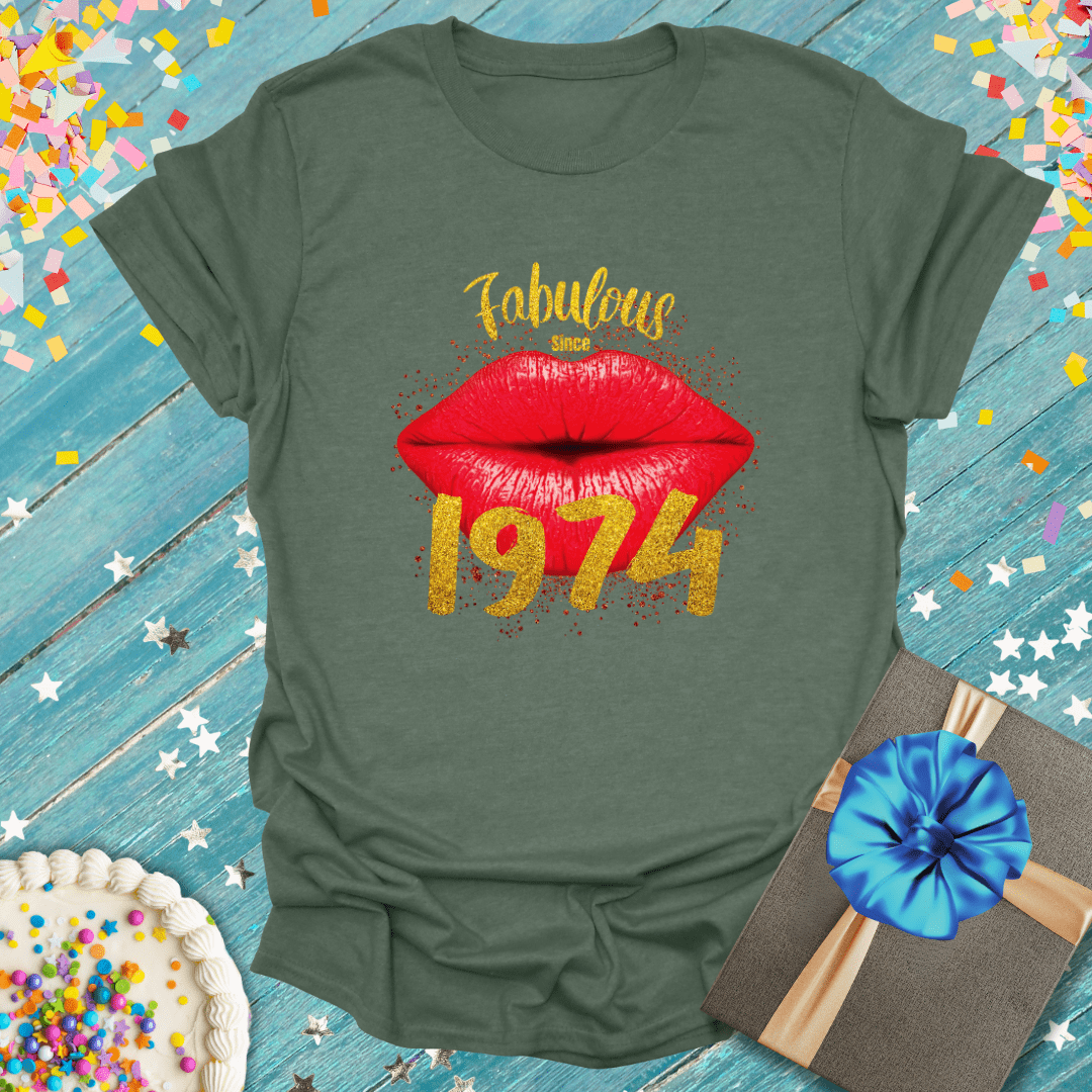 Green birthday tee with 'Fabulous Since 1974' lips graphic, confetti, cake & gift—perfect for milestone celebrations.