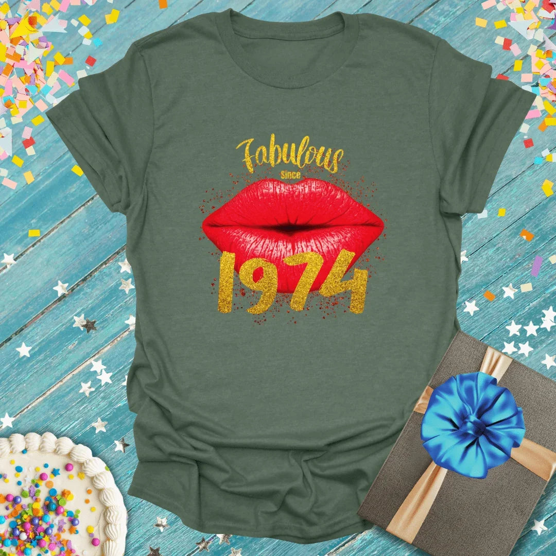 Green birthday tee with 'Fabulous Since 1974' lips graphic, confetti, cake & gift—perfect for milestone celebrations.