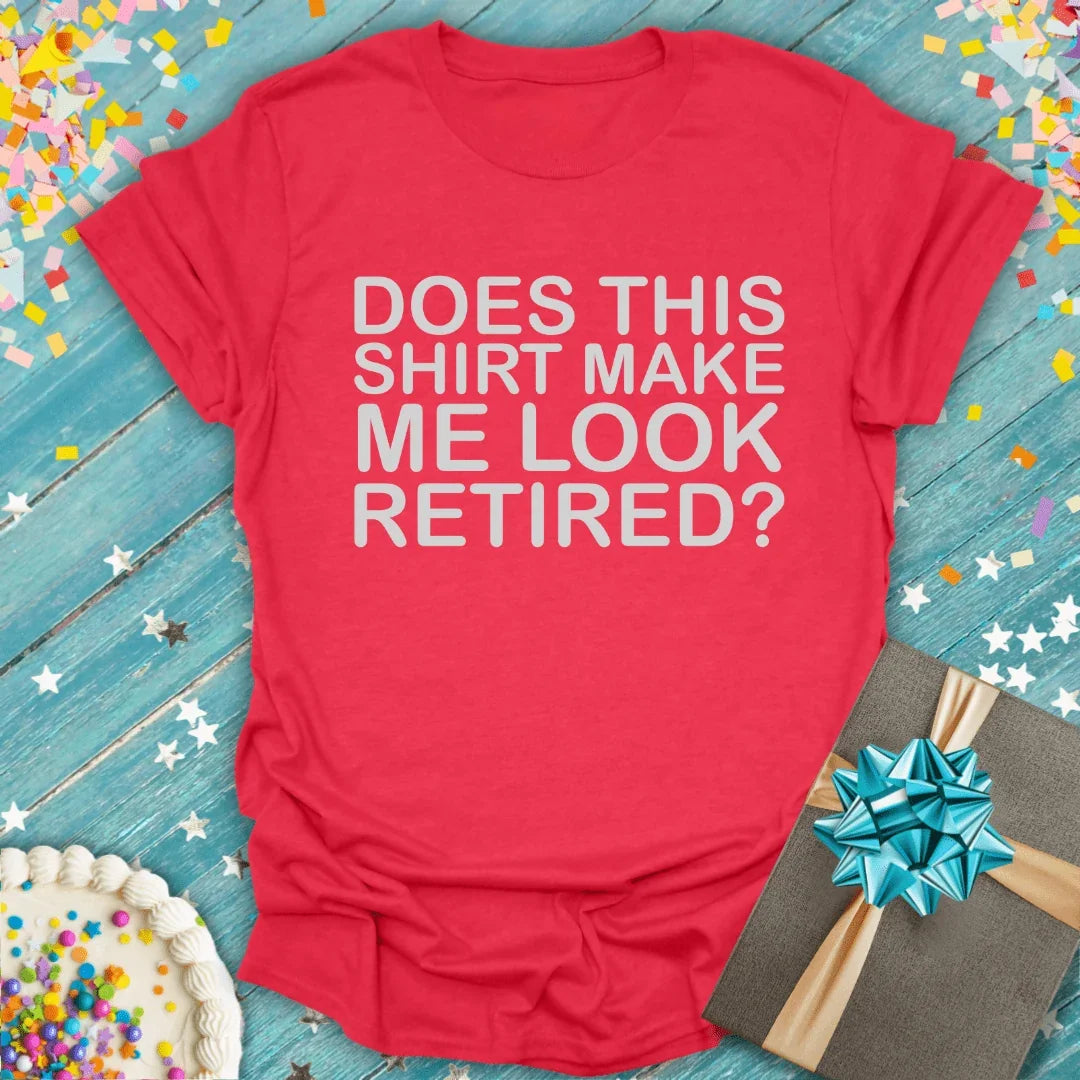 Red funny retirement tee saying 'Does This Shirt Make Me Look Retired?' with cake, gift, confetti