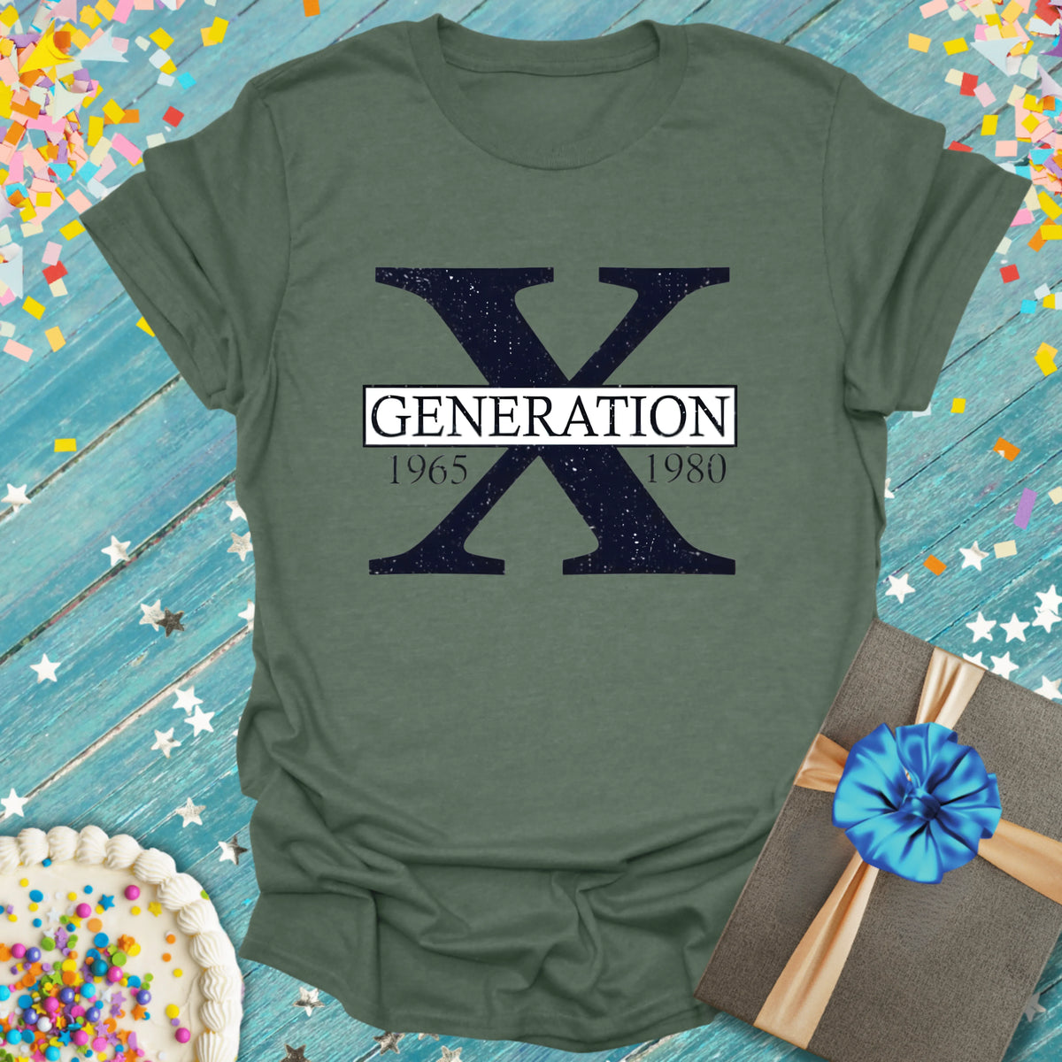 Military green Generation X tee with 1965-1980 design, birthday cake, and gift box on confetti background
