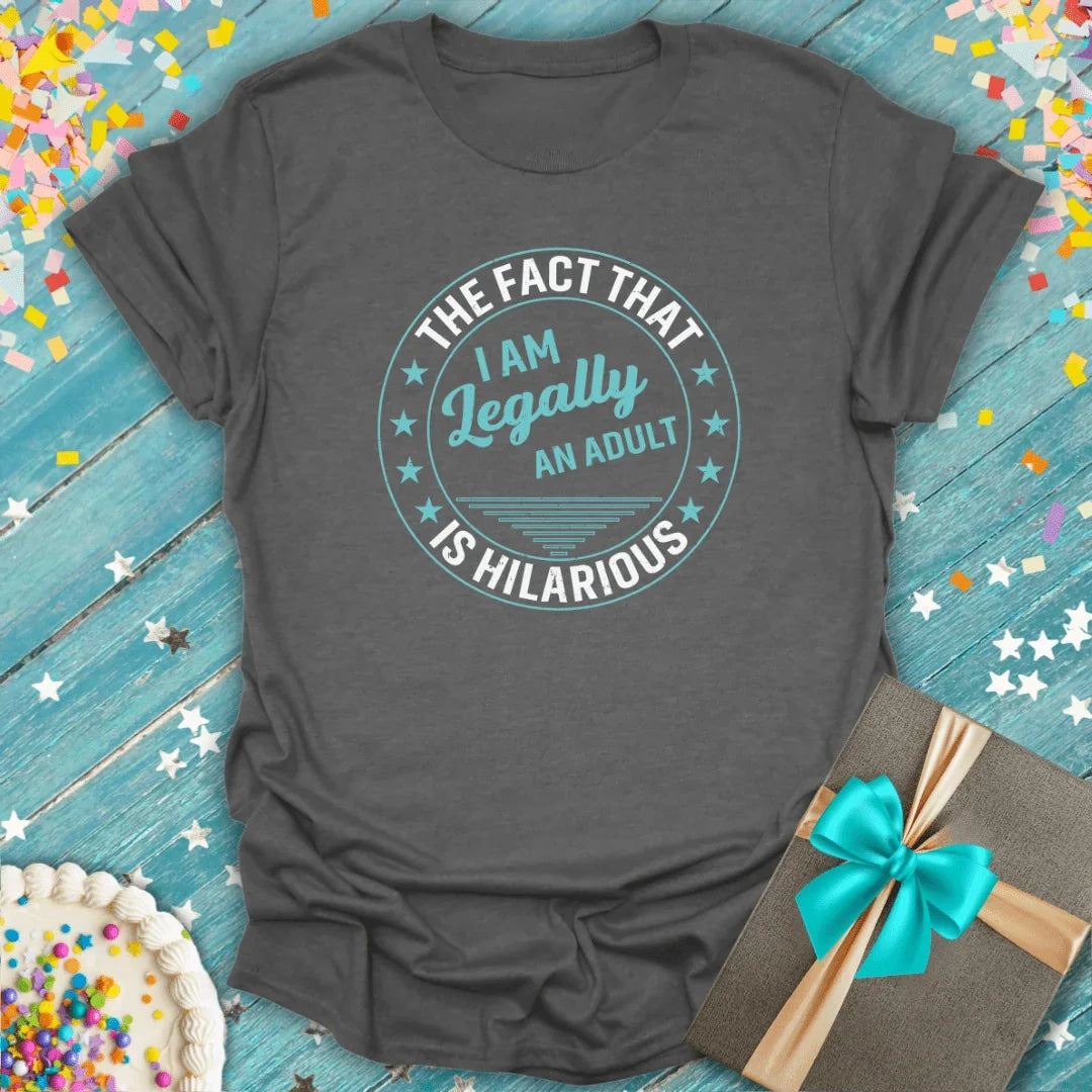 Epic Era Tees charcoal grey t-shirt with a circular graphic stating 'The fact that I am legally an adult is hilarious'.
