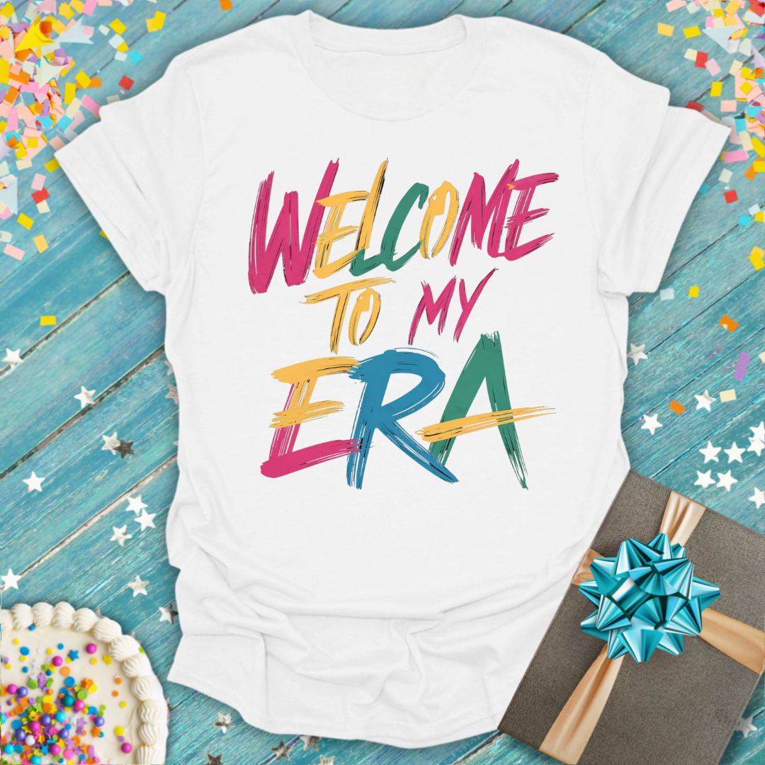 White Epic Era Tees t-shirt with colorful 'Welcome to My ERA' brush-stroke text.