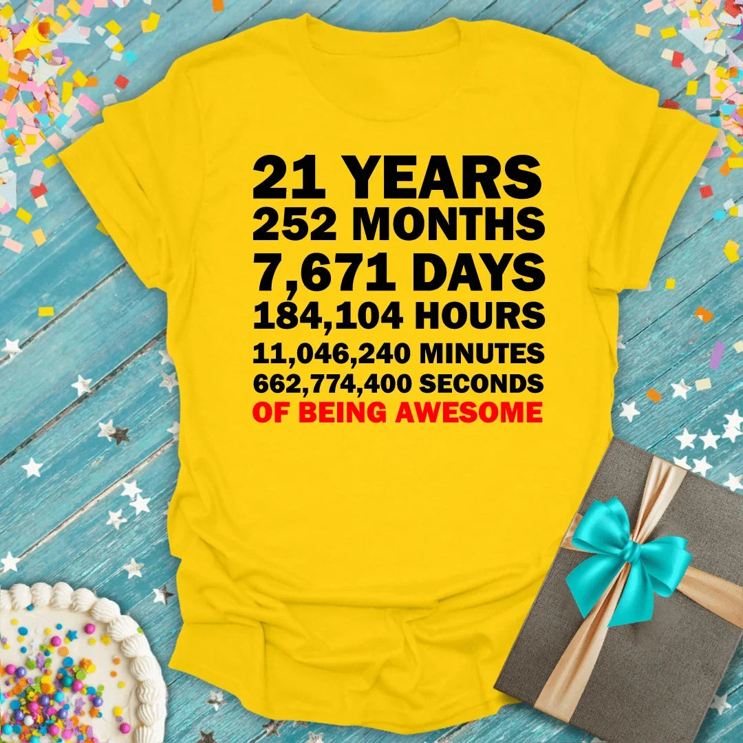 Yellow 21st birthday tee counting years, months, days to seconds of being awesome, with cake & gift