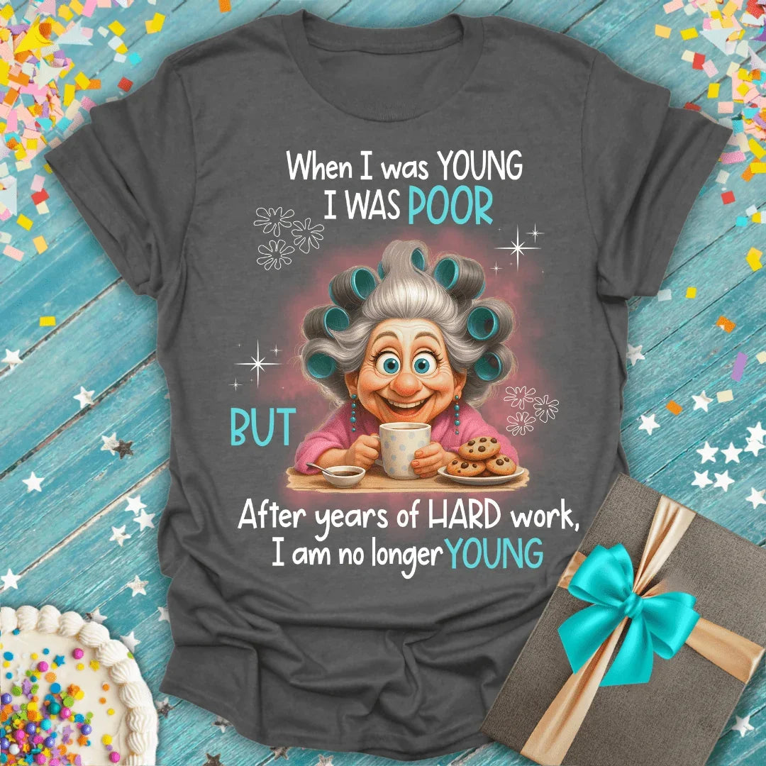 Funny birthday tee with cartoon grandma saying 'When I was young I was poor but after hard work I am no longer young'