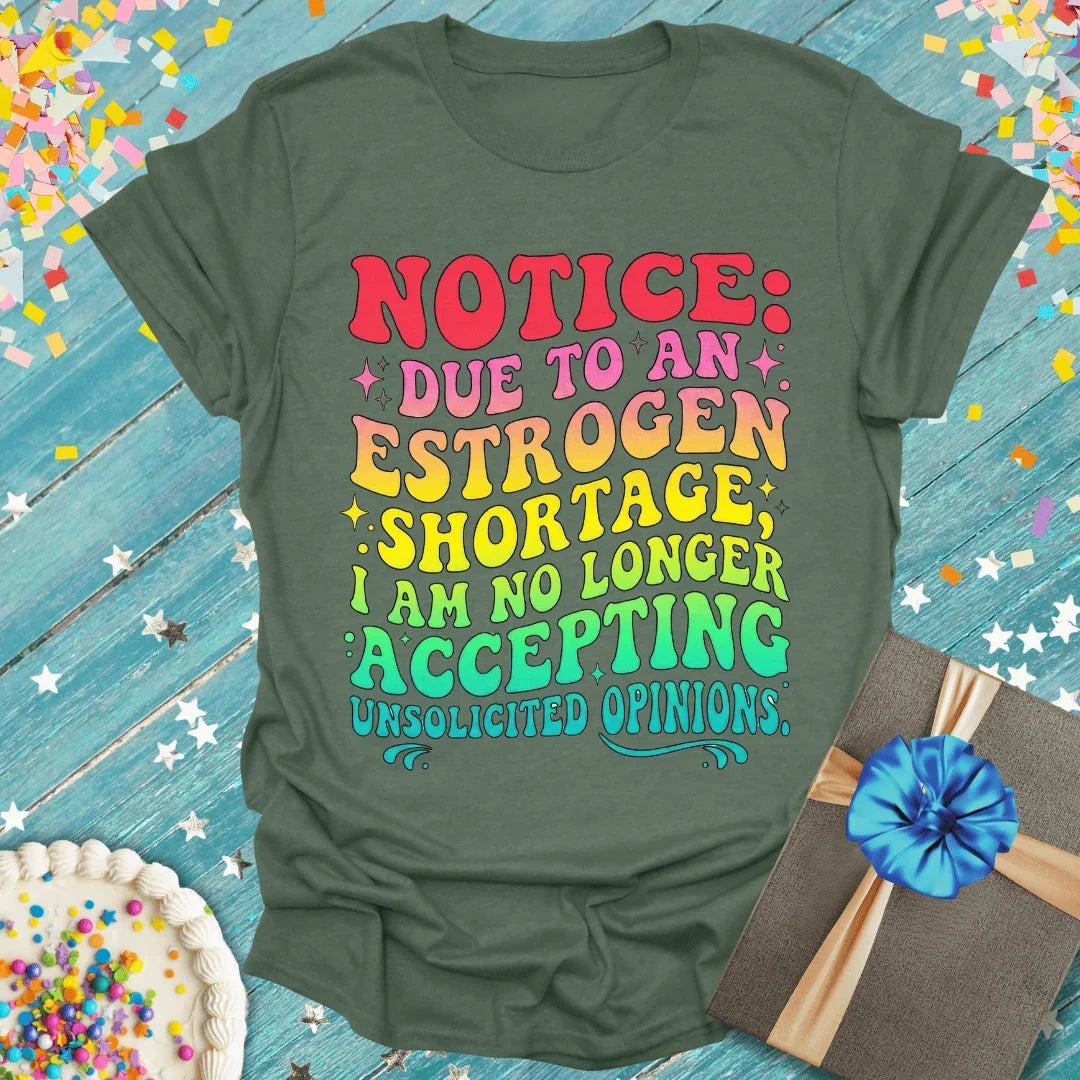 Epic Era Tees olive green shirt with colorful retro text: Notice Due to an Estrogen Shortage.
