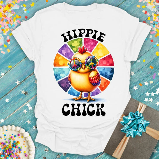 White 'Hippie Chick' tee by Epic Era Tees featuring a chick in peace-sign sunglasses with rainbow wheel background.