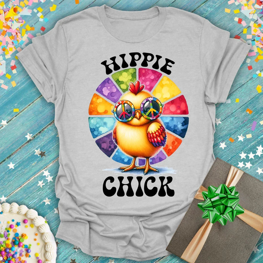 Hippie Chick t-shirt by Epic Era Tees featuring a colorful chick in peace sign glasses, rainbow wheel, bold black text on gray fabric.