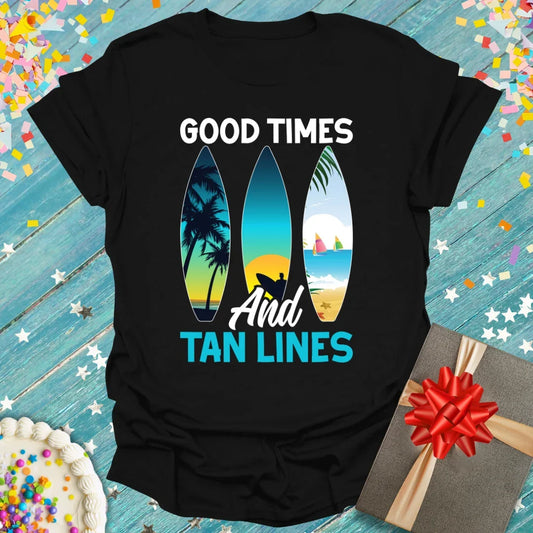 Black t-shirt with 'Good Times And Tan Lines' text and three surfboard graphics showing beach scenes, by Epic Era Tees