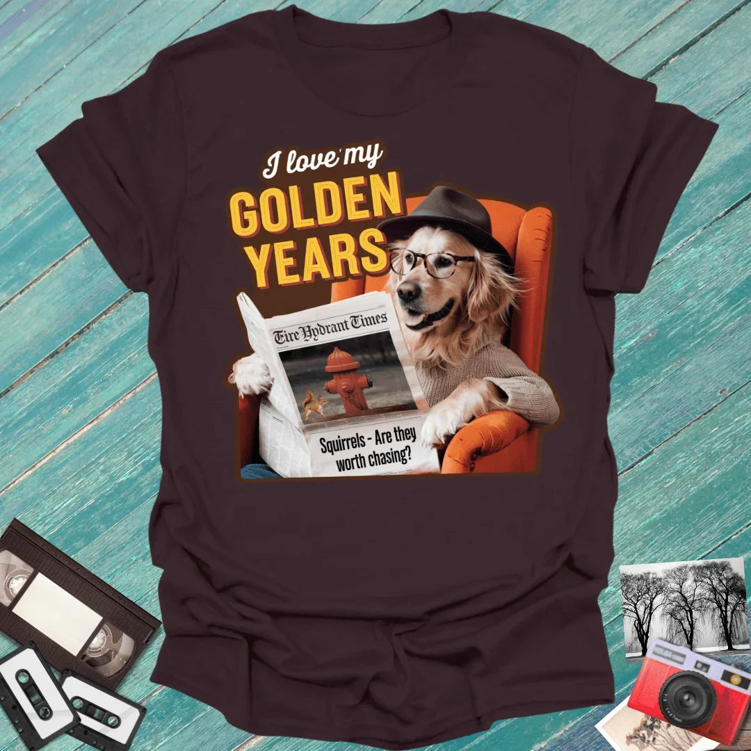 Epic Era Tees maroon shirt featuring a Golden Retriever in a hat reading a newspaper with 'Golden Years' text.