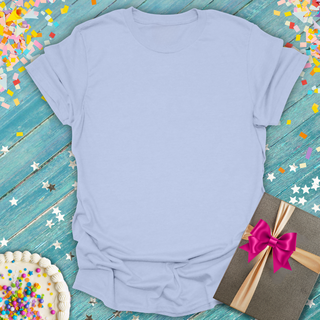 A blank light purple Epic Era Tees t-shirt surrounded by colorful confetti, a cake, and a gift box.