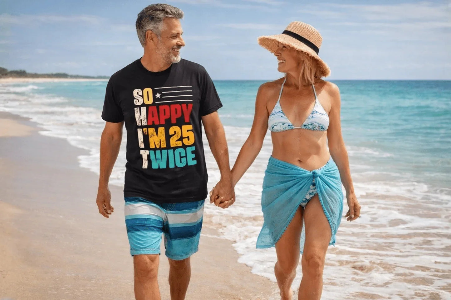 Man in 'So Happy I'm 25 Twice' birthday tee walking beach with woman, soft tees for trips & milestones