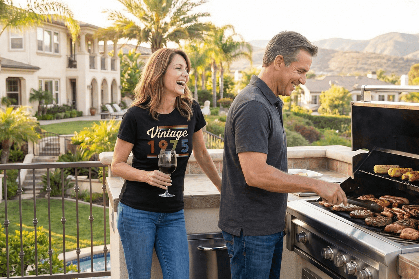 Woman in Vintage 1975 tee laughing with man grilling outdoors, perfect for birthdays or trips
