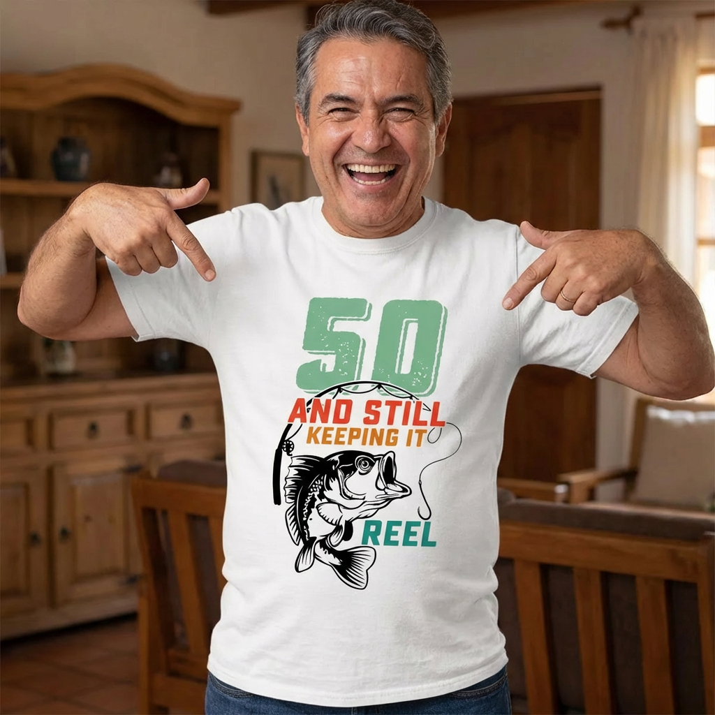 Man wearing a t-shirt that says 50 and still keeping it Reel with a fish and fishing rod on it