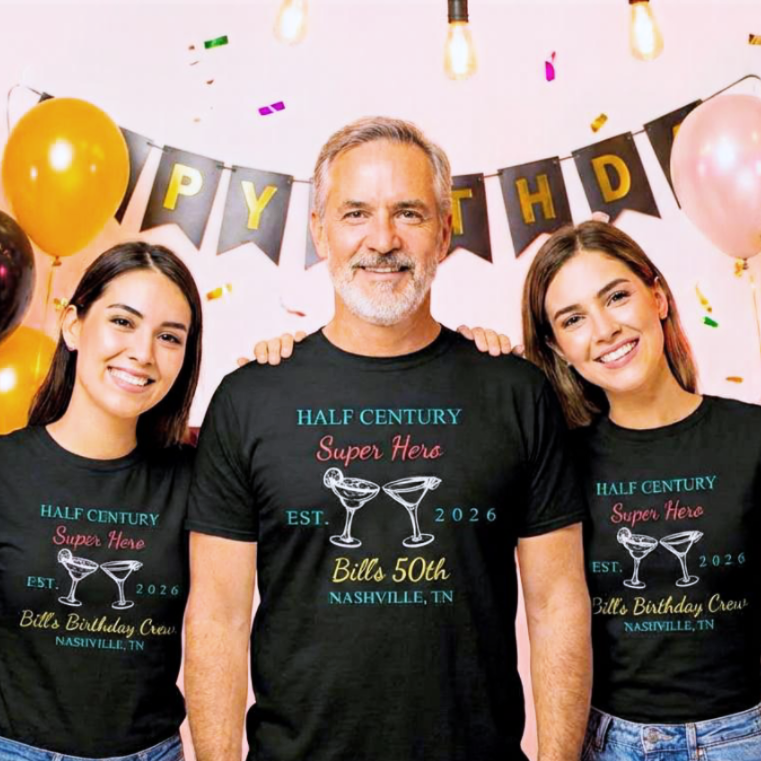 Man at his 50th Birthday party with friends wearing custom made, group party t-shirts with name, date, and funny phrase