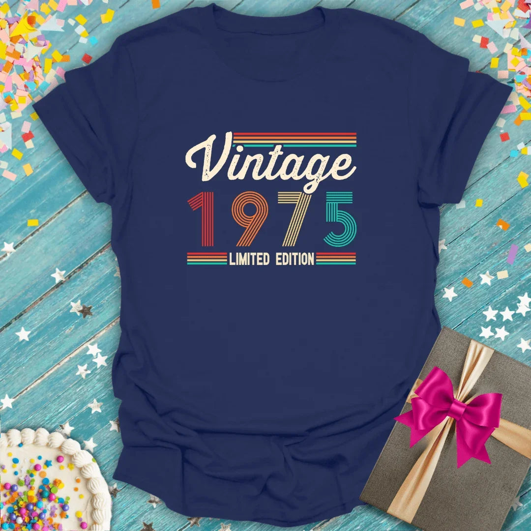 Navy blue Epic Era Tees t-shirt with 'Vintage 1975 Limited Edition' retro striped graphic.