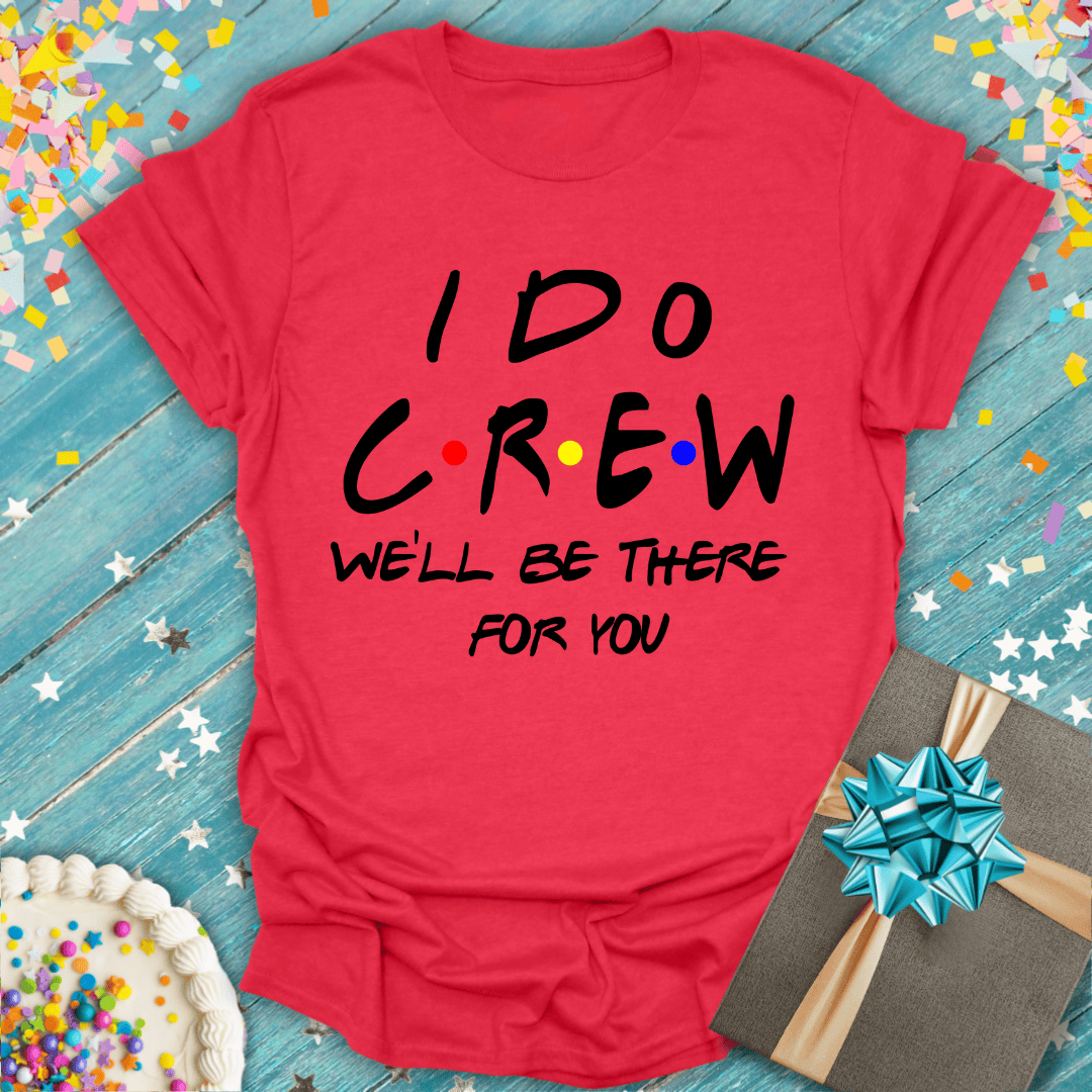 Red 'I Do Crew' tee with 'We'll Be There For You' text, gift box, cake, and confetti for wedding or bridal party