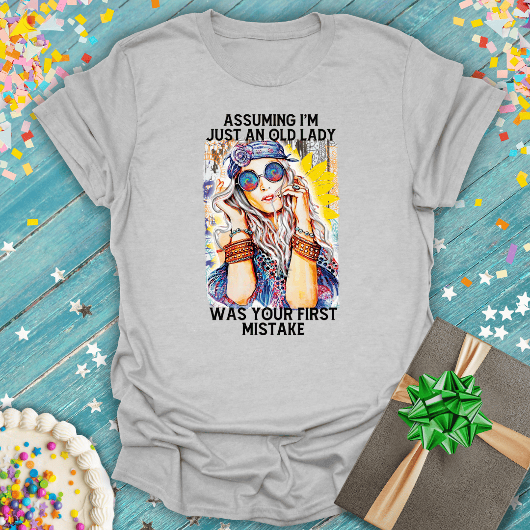 Funny birthday tee: 'Assuming I'm just an old lady was your first mistake' — perfect gift with cake & confetti
