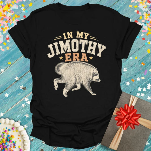 Black t-shirt with 'In My JIMOTHY ERA' text and raccoon graphic, styled by Epic Era Tees for milestone birthdays.
