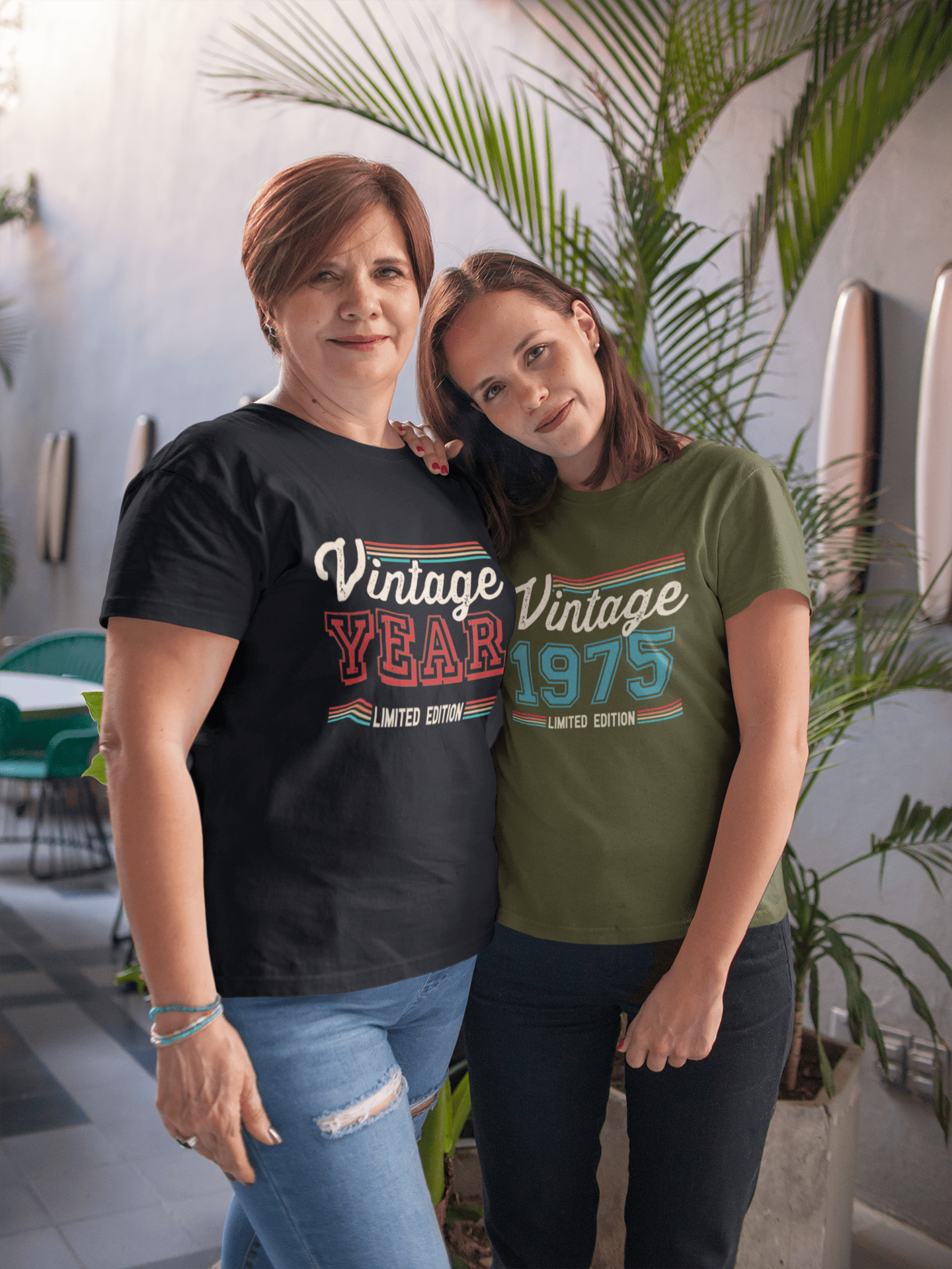 Two women in vintage year 1975 limited edition tees, perfect for birthdays or trips