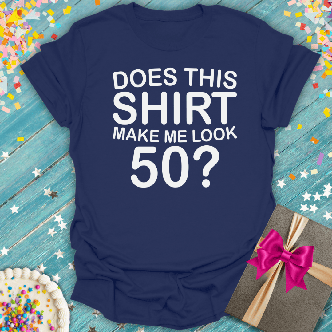 Navy 50th birthday tee with 'Does This Shirt Make Me Look 50?' text, gift box, cake, confetti