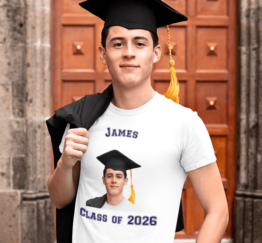 Male graduate wearing a graduation cap and gown over a personalized Class of 2026 photo t-shirt featuring his name and portrait.