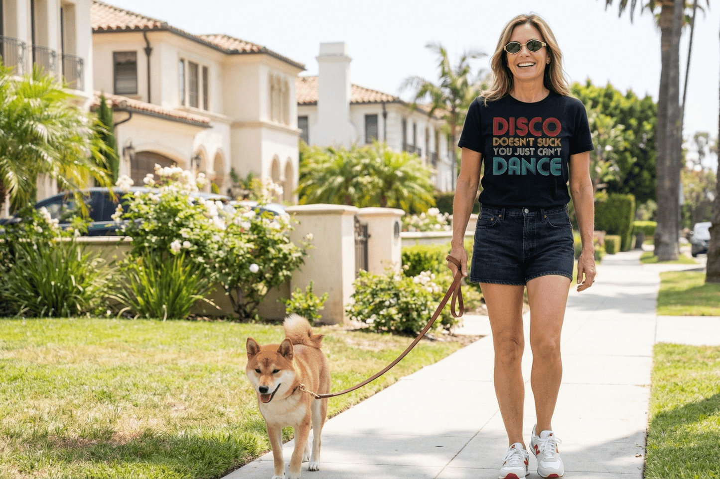 Woman walking dog in 'Disco Doesn't Suck' tee, soft graphic t-shirt for casual outings and birthdays