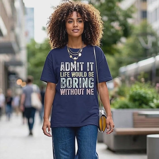 Girl wearing a navy t-shirt that says 'Admit It Life Would Be Boring Without Me'